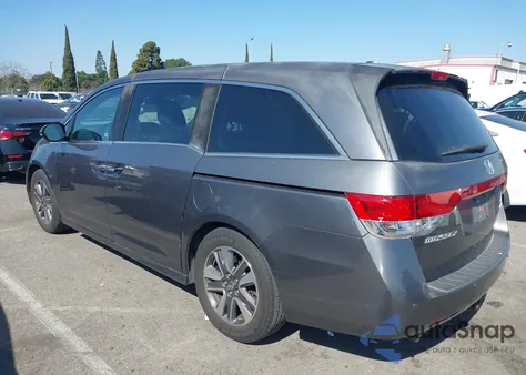 2014 Honda Odyssey Touring/Touring Elite из США, поврежденный, VIN 5FNRL5H9XEB033224